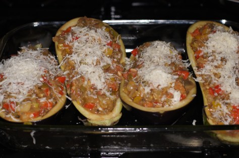 Fill shells with mixture and top with Parmesan cheese