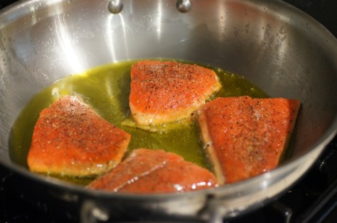 Add salmon to skillet