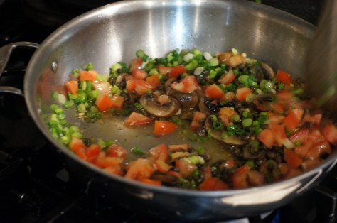 Add scallions, tomato, wine,and capers