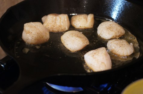 Add scallops to heated skillet