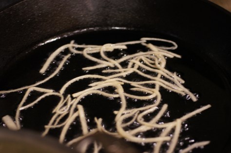 Fry tortilla strips in batches