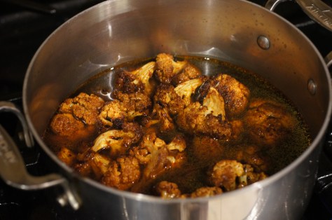 Pour roasted cauliflower into vegetable broth