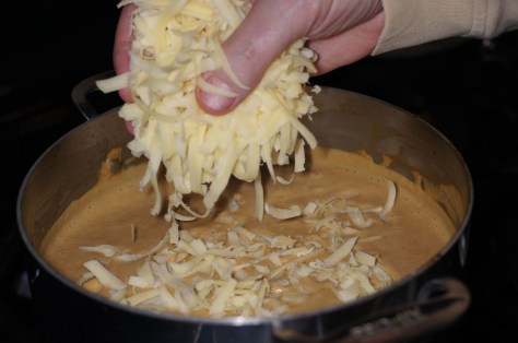 Add grated white cheddar