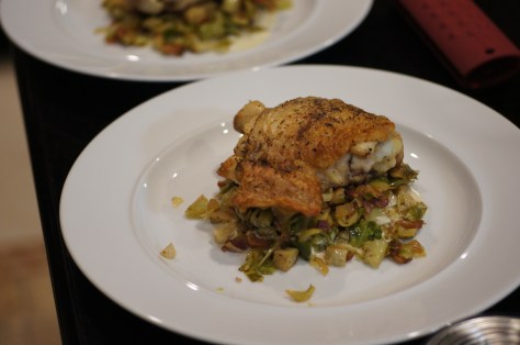 Place chicken thigh on top of hash